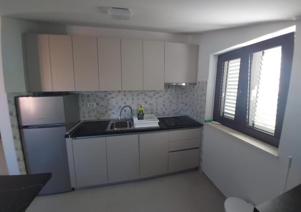 Apartments Boljat โตรกีร์ ภายนอก รูปภาพ